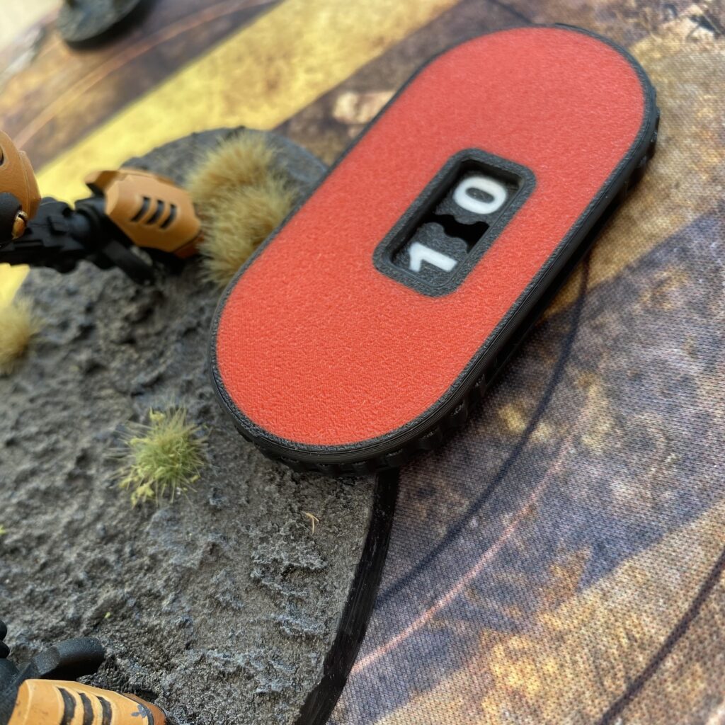 Dial counter on a battle mat